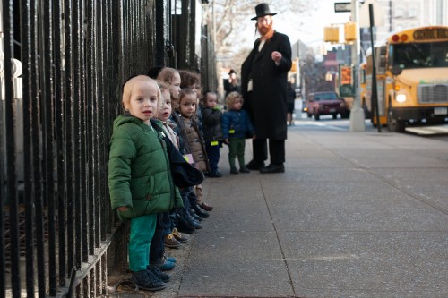 Privatized Satmar pre-school Rabbi and his students. Photo Credit: Mark Hanover