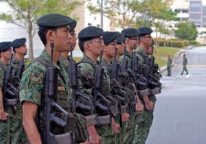 A picture of National Service men in their uniforms.